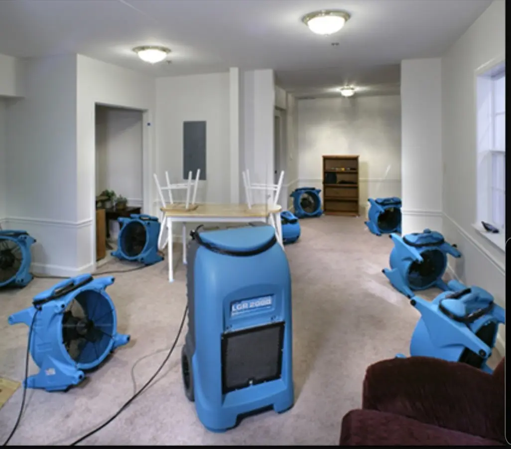 Air movers and dehumidifier setup for Water Damage Restoration in Pinson